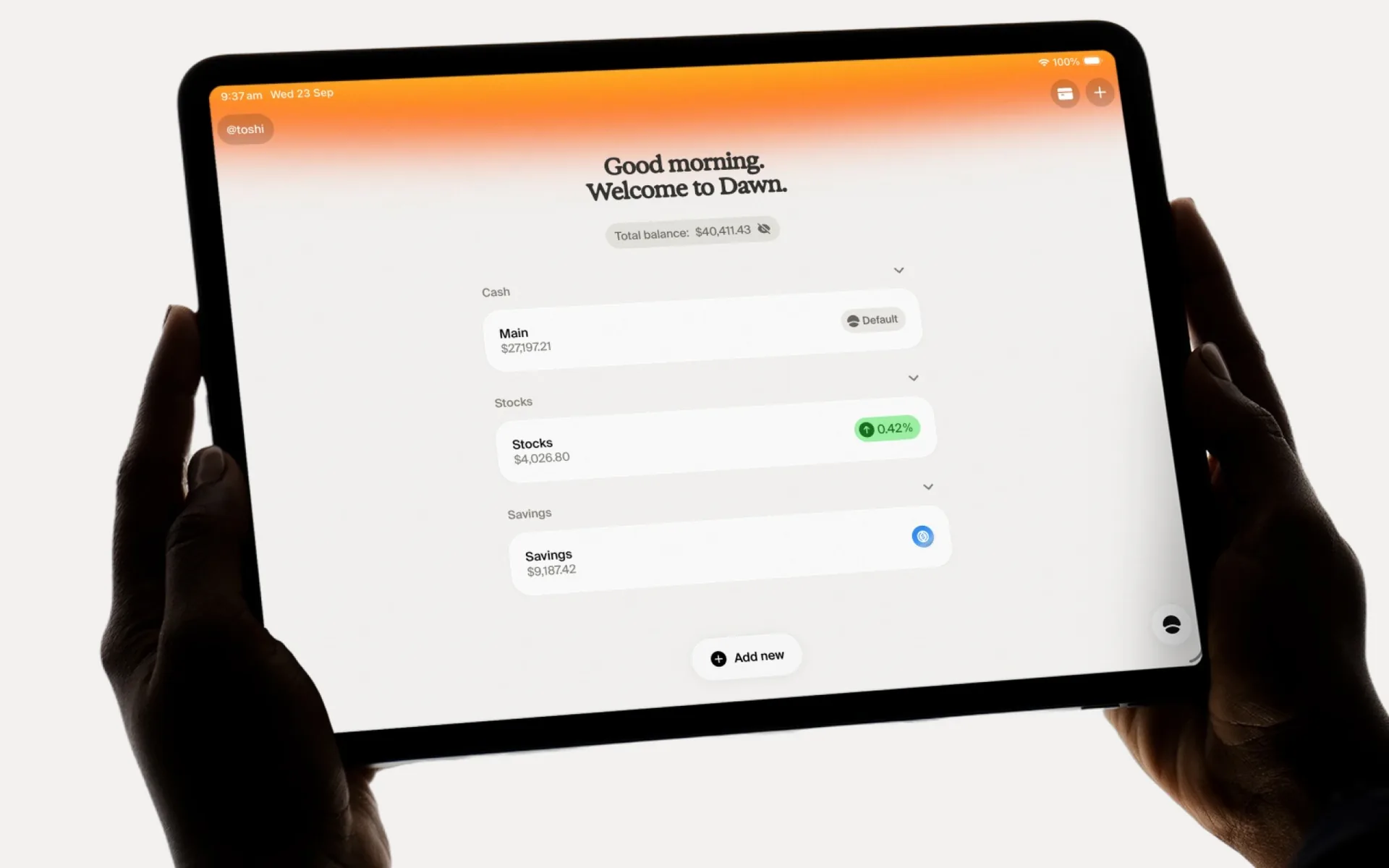Dawn's accounts overview on an iPad held in landscape, with the accounts in a centered column below the greeting